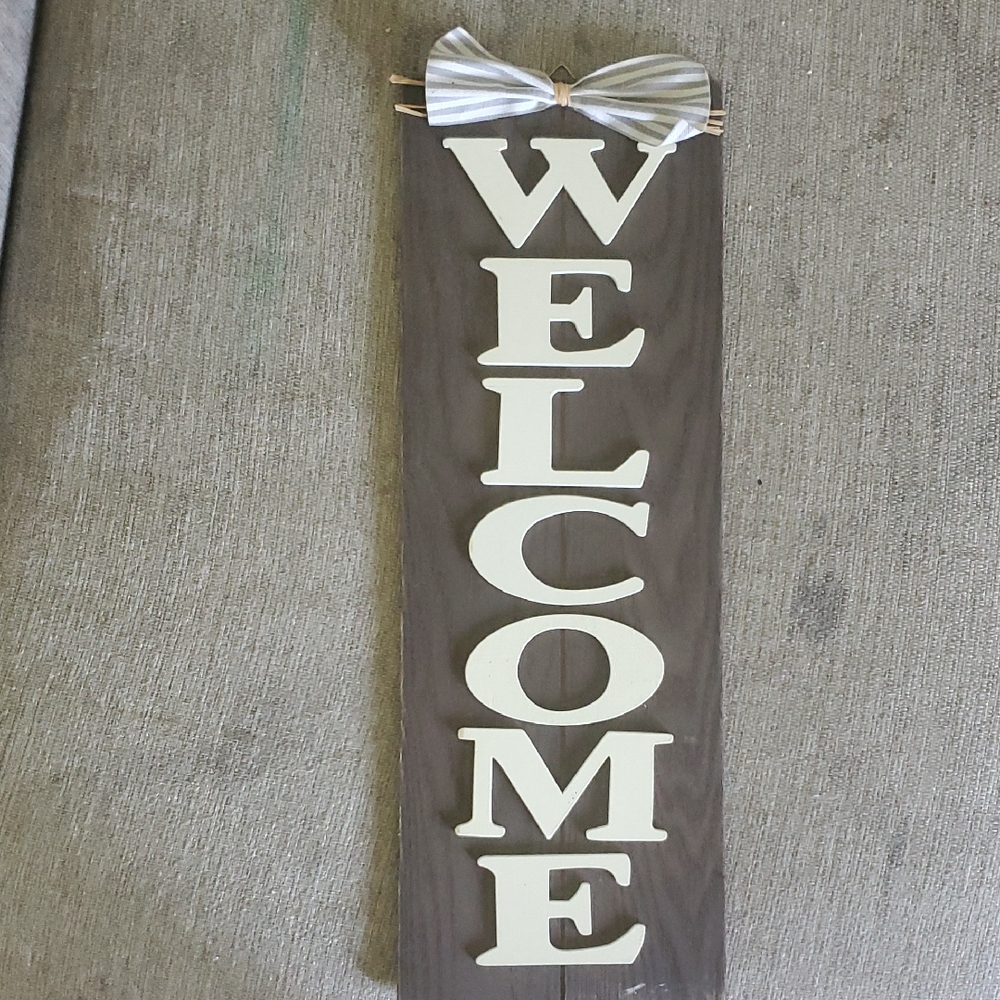 Brown Welcome Sign with Cream Letters